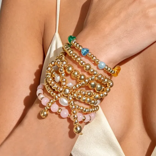 7 Pc. Stacked Golden Bow Bracelet Set