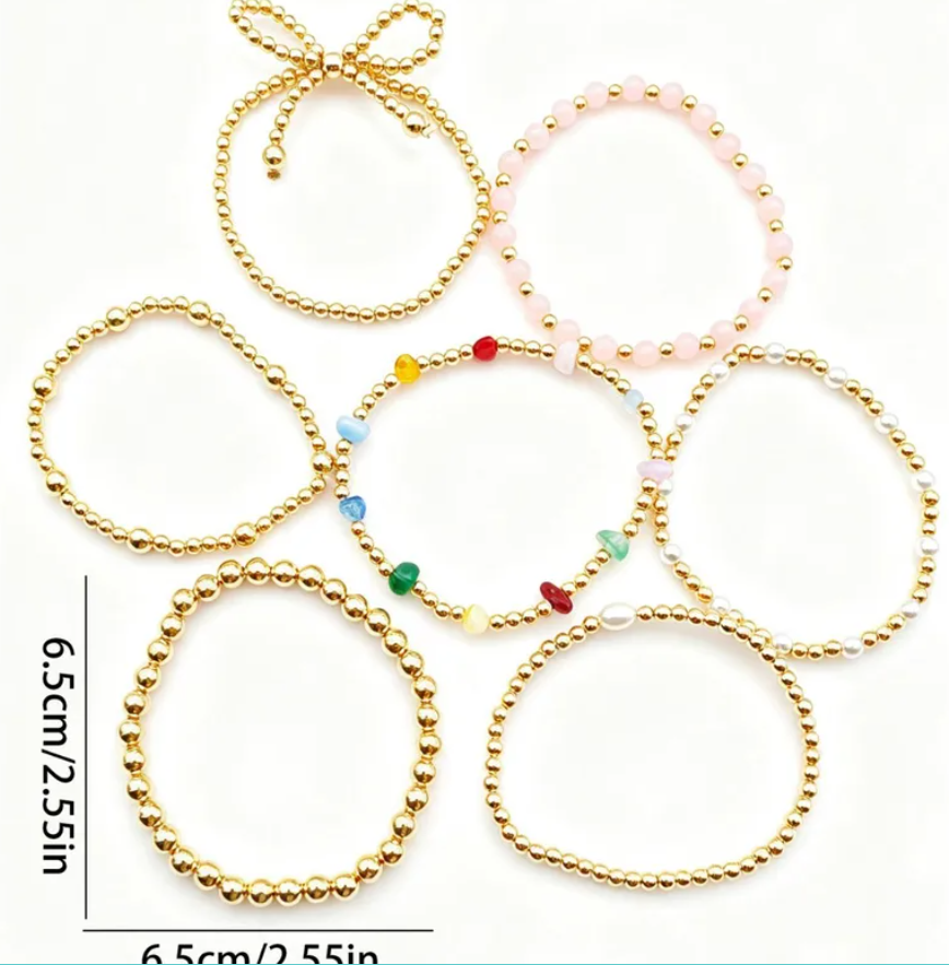 7 Pc. Stacked Golden Bow Bracelet Set