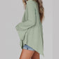 Tanja Green Ribbed Expose Seam Bell Sleeve Top