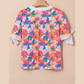 Kimia White Floral Colorblock Striped Edge V Neck Knotted Short Sleeve Blouse