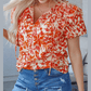 REDUCED!!!  Gabriella Orange Floral Print Ruffled Short Puff Sleeve Split Neck Blouse  REDUCED!!!