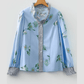 Shaina Sky Blue Floral Print Contrast Striped Trim Ruffled V Neck Fall Blouse