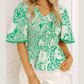 Macie Green Flirty Floral Smocked V Neck Blouse