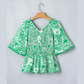 Macie Green Flirty Floral Smocked V Neck Blouse