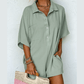 Jorgie Spinach Green Half Button Collared Loose Romper
