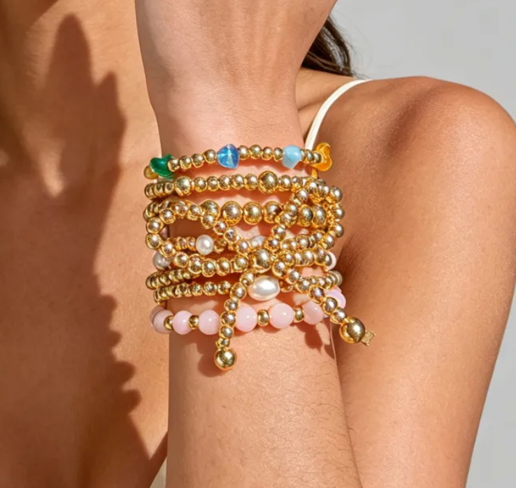 7 Pc. Stacked Golden Bow Bracelet Set