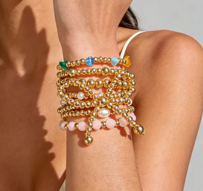 7 Pc. Stacked Golden Bow Bracelet Set