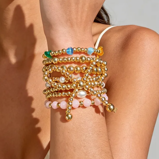 7 Pc. Stacked Golden Bow Bracelet Set