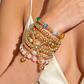 7 Pc. Stacked Golden Bow Bracelet Set