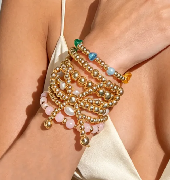 7 Pc. Stacked Golden Bow Bracelet Set