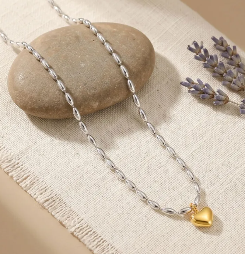 Oval Bead Necklace Featuring Heart Accent