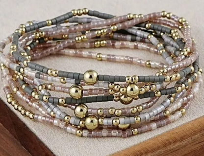 9 Pc. Multi‑Strand Metallic Accent Bracelet Stack