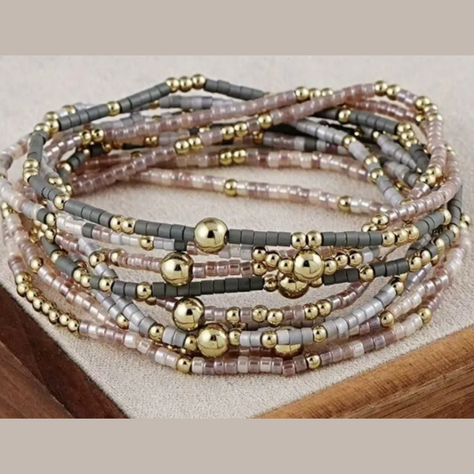 9 Pc. Multi‑Strand Metallic Accent Bracelet Stack