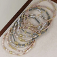 9 Pc. Multi‑Strand Metallic Accent Bracelet Stack