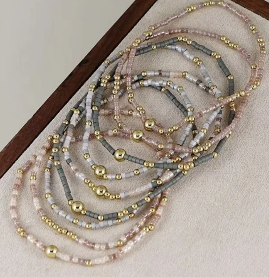 9 Pc. Multi‑Strand Metallic Accent Bracelet Stack