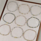 9 Pc. Multi‑Strand Metallic Accent Bracelet Stack