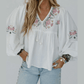 Chelsie White Flower Lace-up V Neck Babydoll Blouse