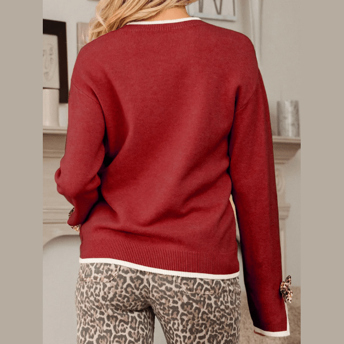 Aliza Red Leopard Bow Decor Split Cuff Contrast Trim Sweater