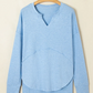 Remy Blue Notched Neck Terry Raw Hem Long Sleeve Top