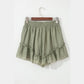 Andrea Laurel Green Textured Tie Waist Ruffle Hem Shorts