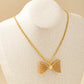Golden Bow Tie Necklace
