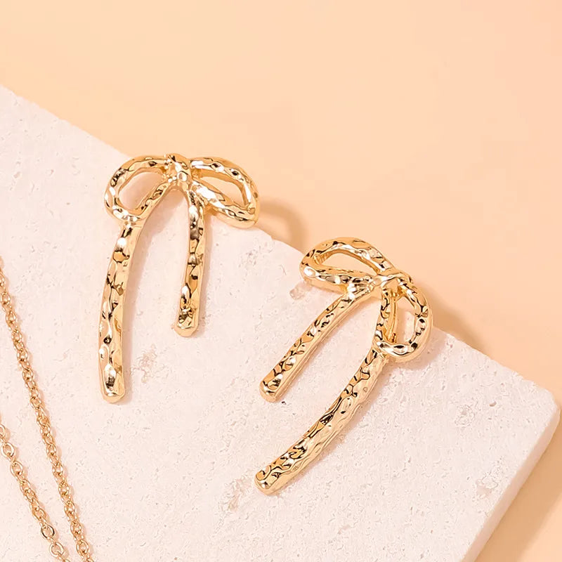 Golden Bow Stud Earrings