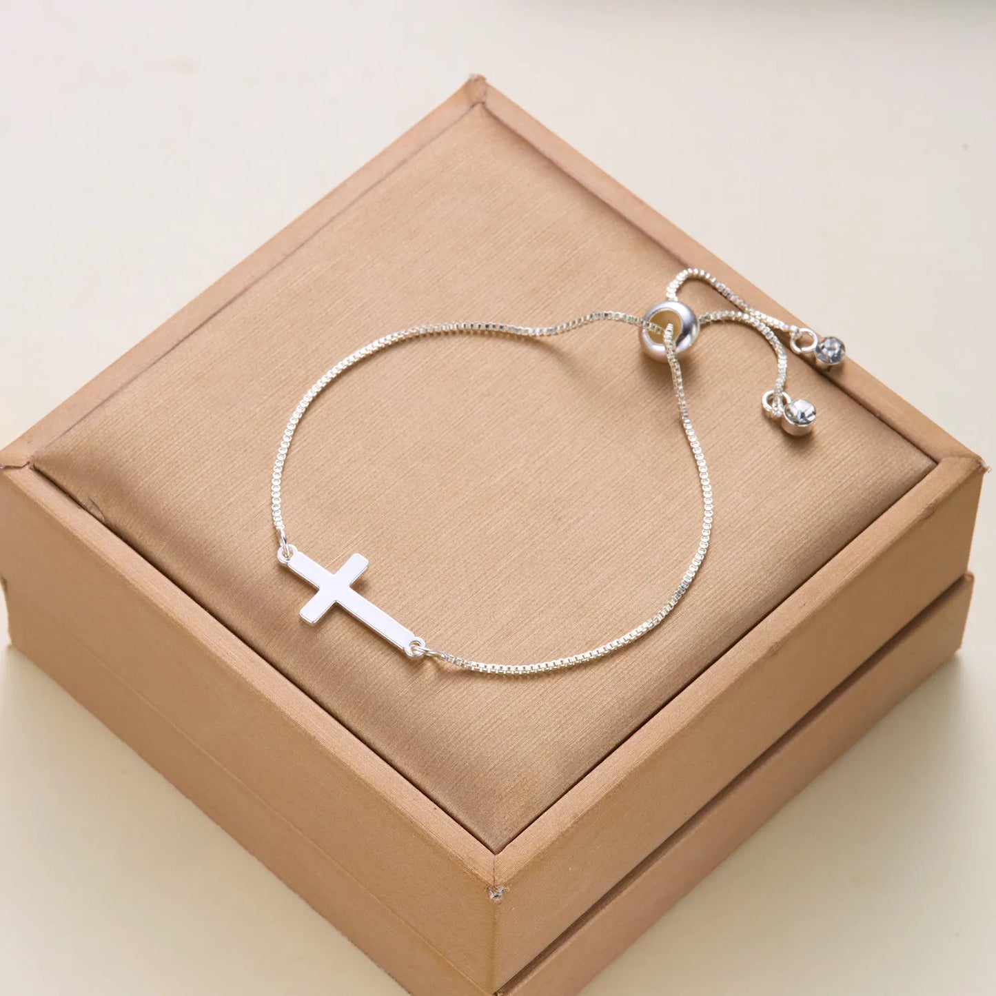 Silver Cross Lariat Bracelets
