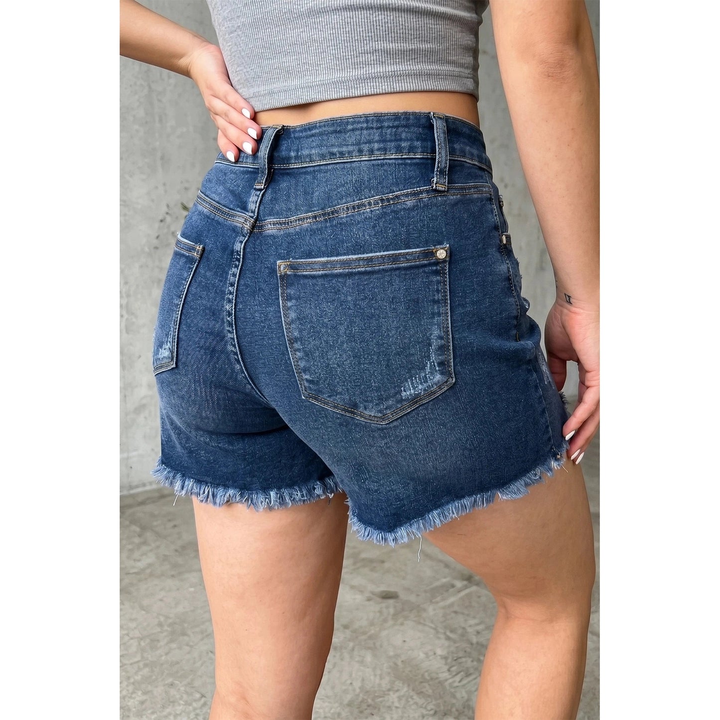 Alberta Dark Blue Asymmetric Raw Hem Distressed Whiskery Denim Shorts