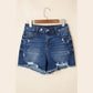Alberta Dark Blue Asymmetric Raw Hem Distressed Whiskery Denim Shorts