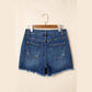 Alberta Dark Blue Asymmetric Raw Hem Distressed Whiskery Denim Shorts