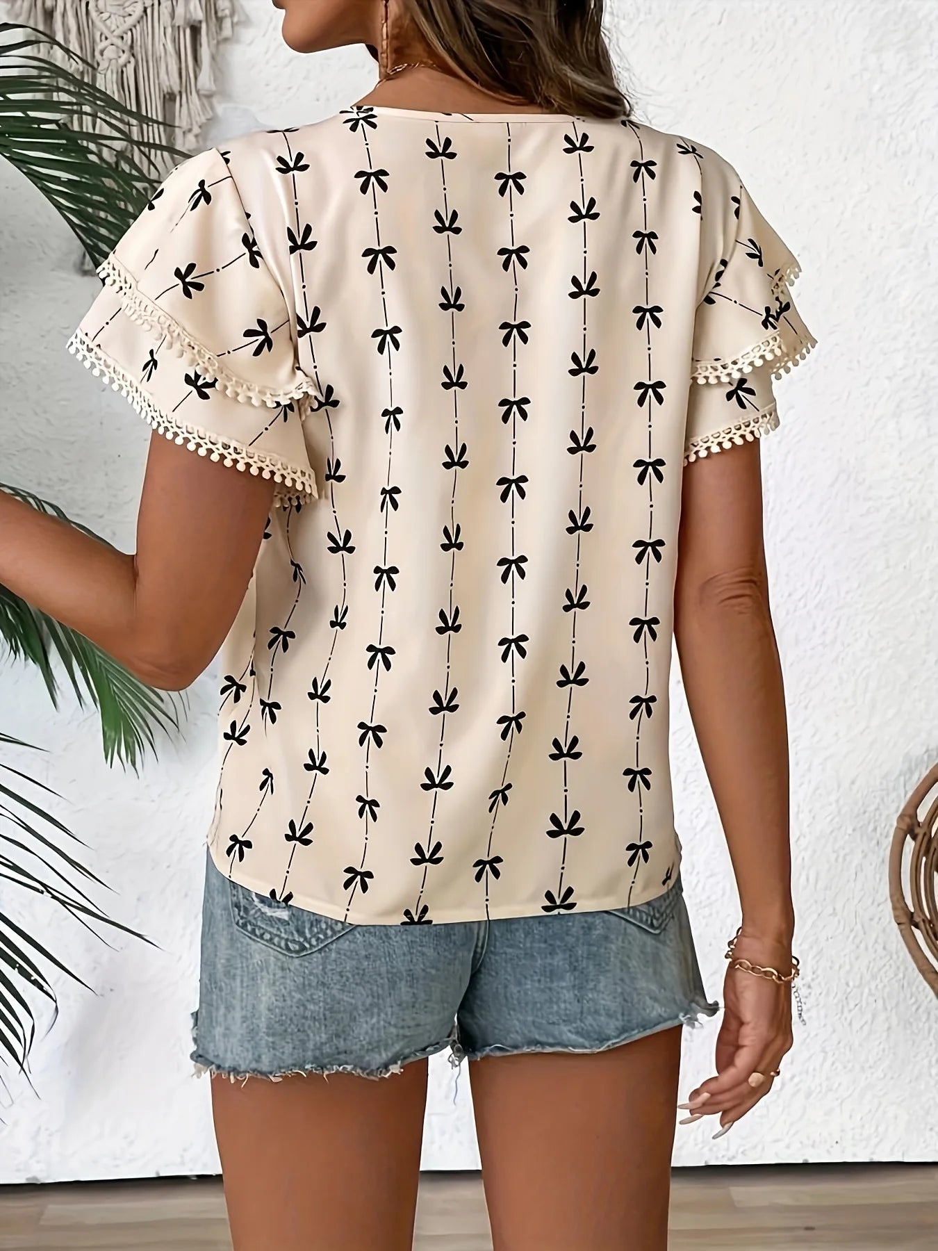 Karlea Playful Bow Ruffle Top
