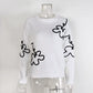 Lorenda White Floral Pattern Drop Shoulder Sweater