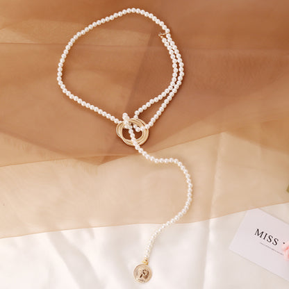 Faux Pearl Necklace with Gold Clasp & Drop Strand