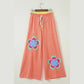 Kendyl Orange Color Block Flower Patchwork Drawstring Contrasted Elastic Waist Wide Leg Pants