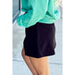 Orna Black Solid Color Wrapped Side Slit Skort