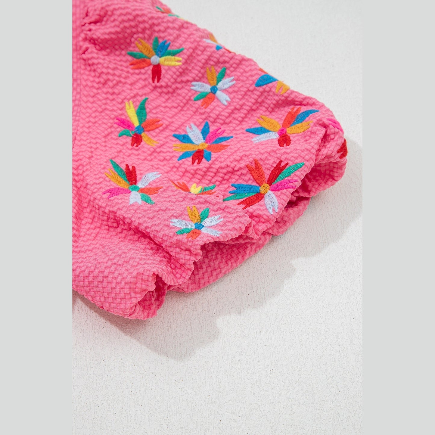 Apryl Sachet Pink Frilled V Neck Flower Embroidered Puff Sleeve Textured Blouse