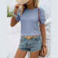 Rochelle Light Blue Textured Short‑Sleeve V‑Neck Top