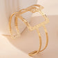 Golden Hammered Overlapping‑Square Bracelet